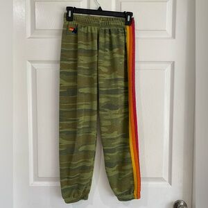 Aviator Nation Camouflage Track Pants with Rainbow Stripe